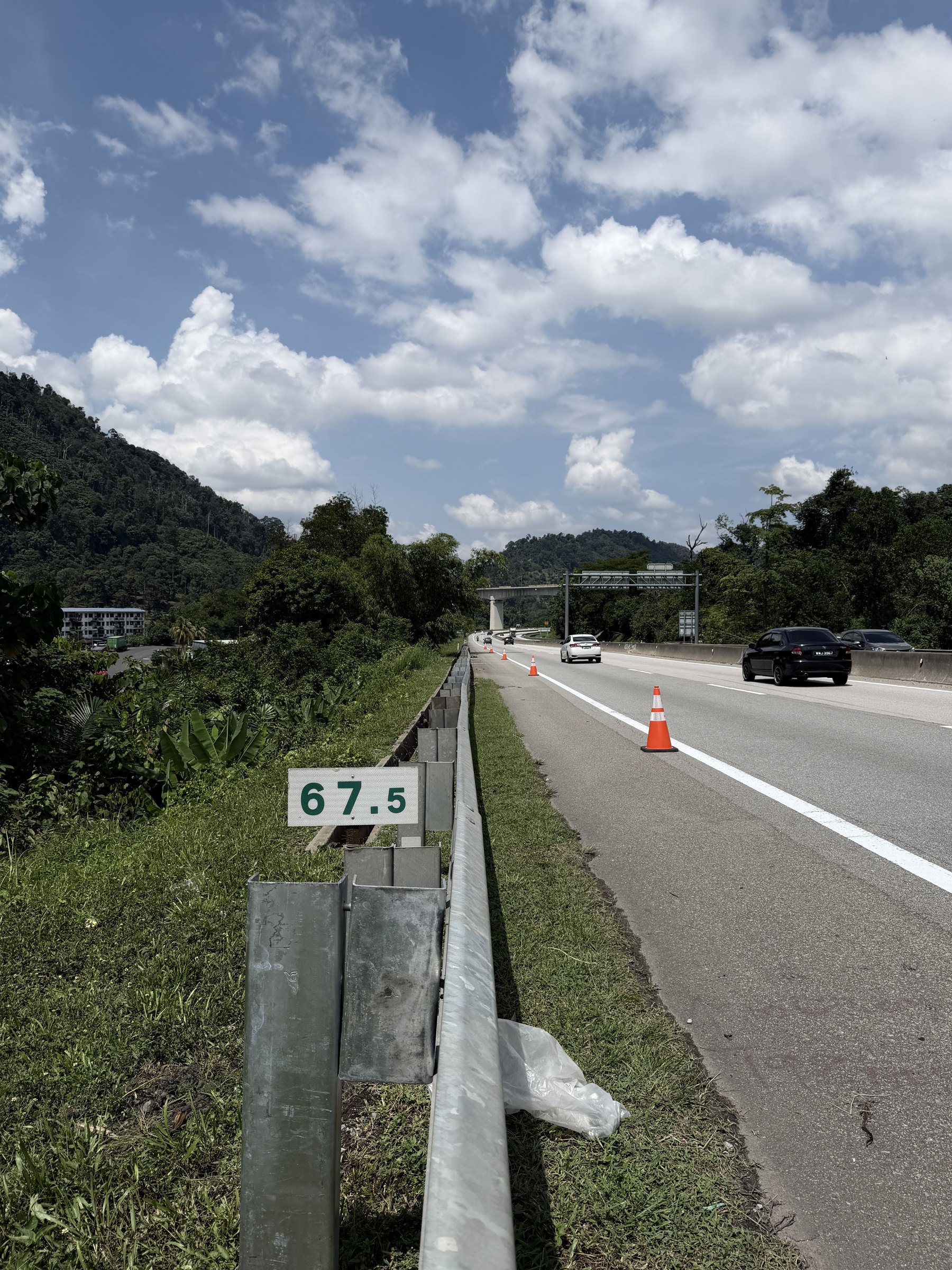 Guardrail and road marking alongside a highway near Bentong at KM67.5